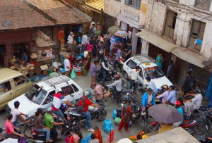 Looking down on a Kahtmandu traffic jam, cars and bikes