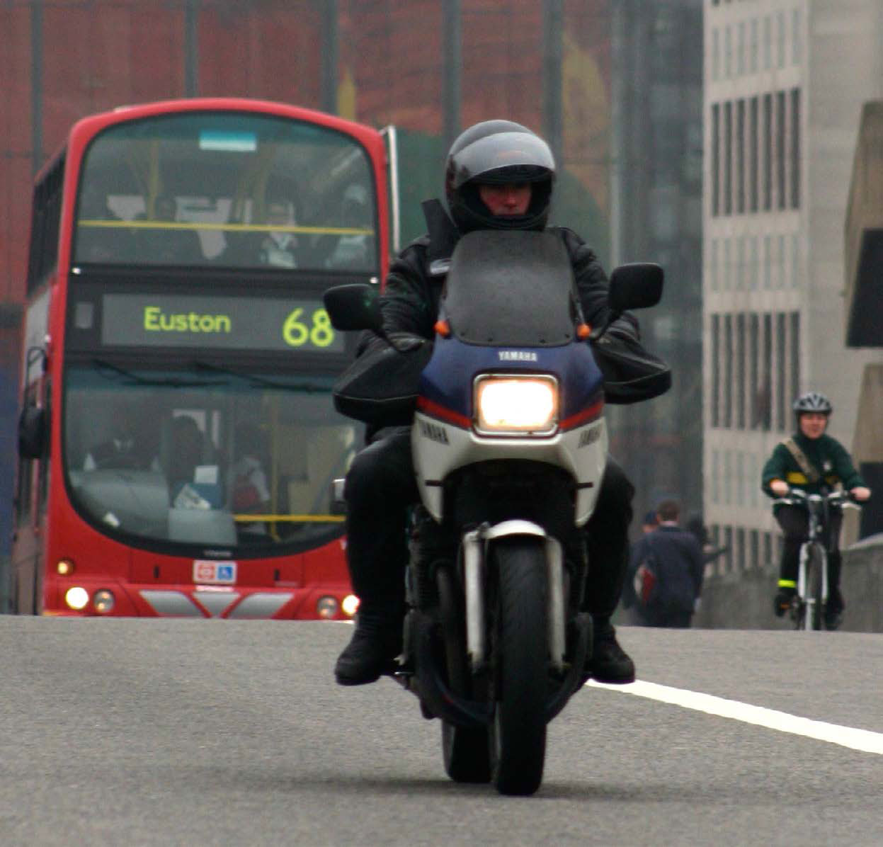 A despatch rider riding a Yamaha XJ600